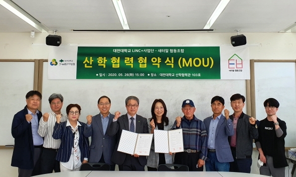 박시용 부단장(왼쪽 다섯 번째)과 최영숙 이사장(오른쪽 다섯 번째) 및 양기관 관계자가 업무협약 후 단체사진 촬영