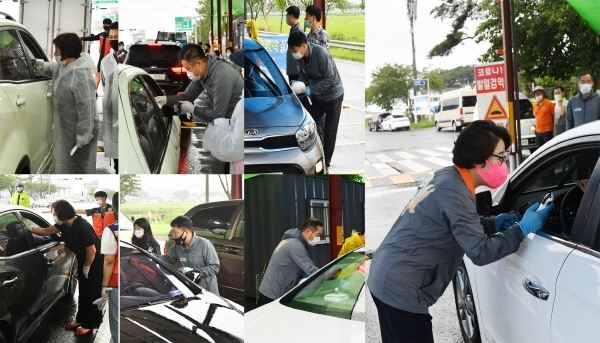 박금순 의장을 비롯한 의원들이 대천해수욕장 입구에서 검역활동을 전개하고 있다.