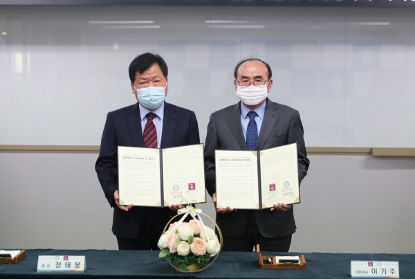 세종시체육회-베스트웨스턴호텔세종 업무협약. 사진 왼쪽부터 정태봉 시체육회장과 이기주 베스트웨스턴호텔 대표이사