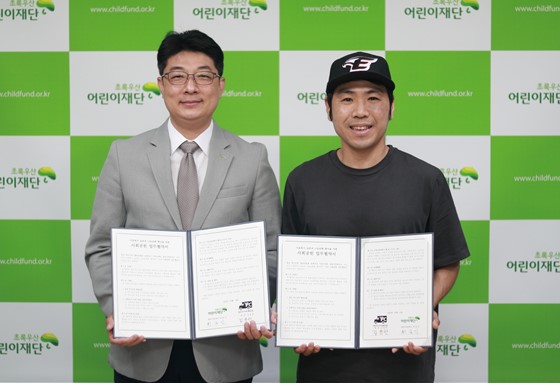 최승인 초록우산어린이재단 대전지역본부장(좌), 김윤관 청년푸드트럭협동조합 대표(우)